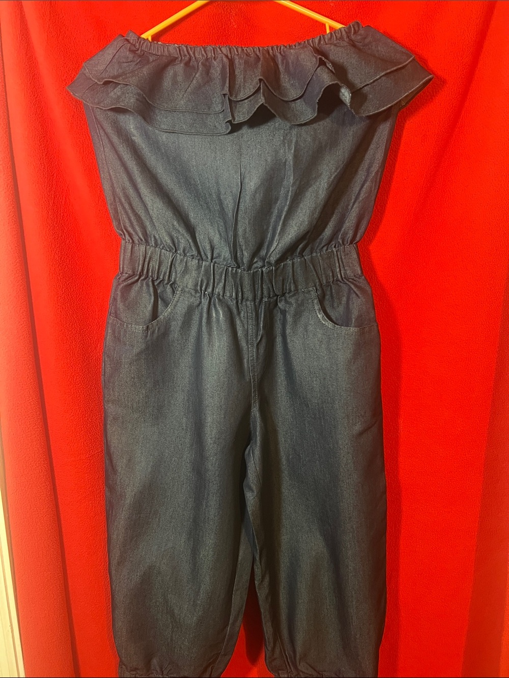 Ruffled Off-Shoulder Denim Jumpsuit in Dark Blue